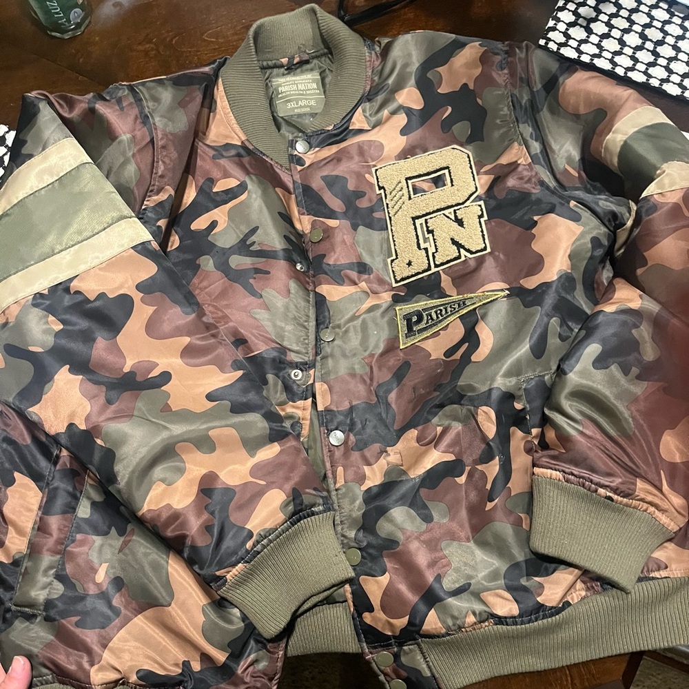 Men’s parish nation is the Camo Bomber Jacket with Patch